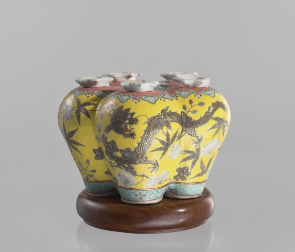 Vase in the shape of five connected vases on a base; maker, Chinese; colored porcelain with dragons