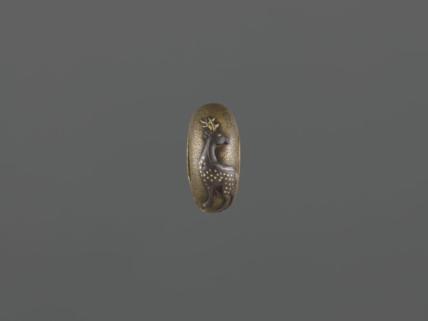 String threading knob kurigata, Melee weapon hilt fitting with side holes, undercut. Depicts deer,
