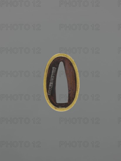 Sword hilt ferrule kashira, Japanese, katana hilt ferrule. Flower rosette with stylized tendril.
