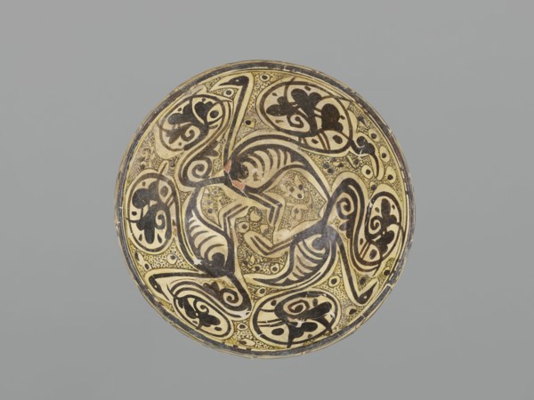 Bowl, maker, 10th century; Nishapur, Iran; Persian Islamic ceramic vessel decorated with images of