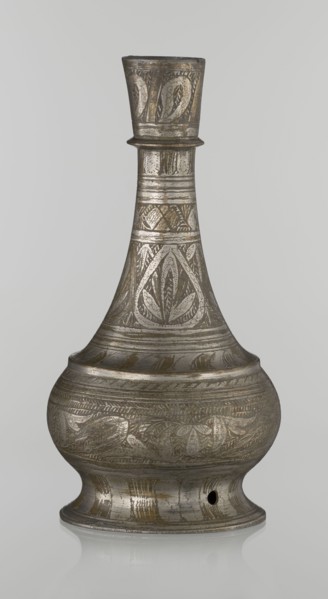Bottle, Islamic art, Arabic culture, geometric ornament, plant motifs. Neck slender towards the