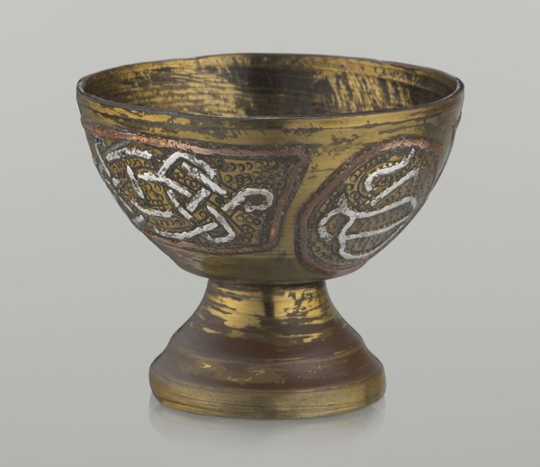 Bowl;, Decoration with braid and stylized Arabic inscriptions in cartouches; punctured background;