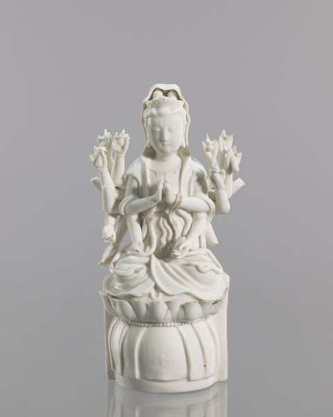 Guanyin on a lotus throne, Chinese, Blanc de Chine porcelain, 18th century, Fujian, China;