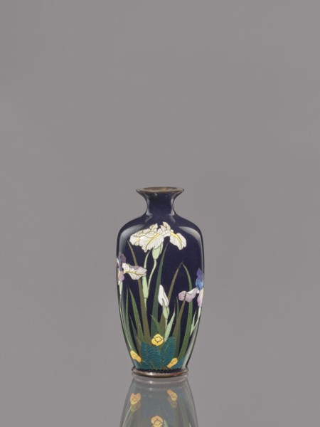Vase, Ovoid vase with a short, thin, flared neck decorated with irises on a dark blue background.
