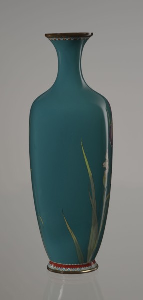Ovoid vase one of a pair, slender, on a low ring-shaped foot and a narrow neck, flaring at the rim.