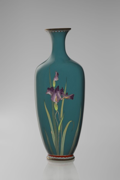 Vase, ovoid one of a pair, slender on a low ring-shaped foot with a narrow neck flaring at the rim;