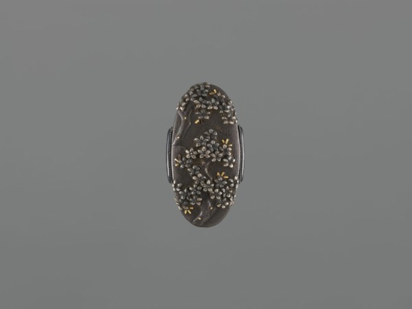 Sword hilt cap kashira, ; decorated with flowers and twigs, grained background, gold and silver