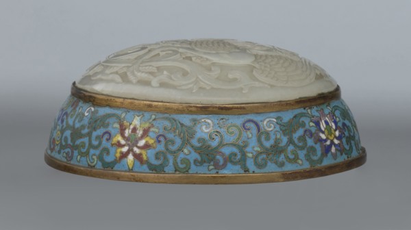 Box with a lid; cloisonné enamel on metal with a slightly convex bas-relief grayish jade plaque on