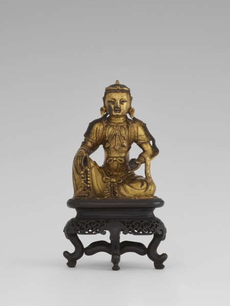 Bodhisattva Manjushri, on a base. Chinese; Qing dynasty 1644–1911. Wood sculpture with wooden stand