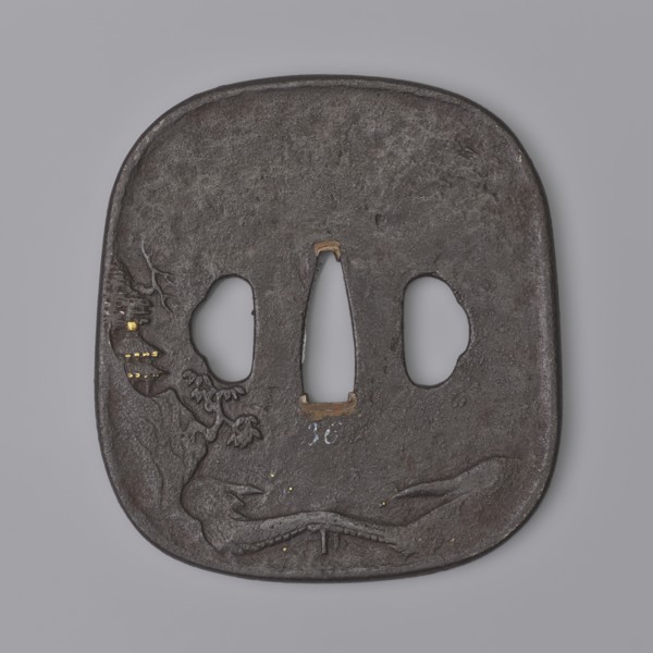Crossguard tsuba, Kaneie craftsman, Japanese, Edo period 18th century. Tsuba in the shape of a