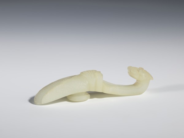 Belt clasp, Chinese, Qing dynasty 1644–1911, 18th–19th century. Milky-white translucent jade.