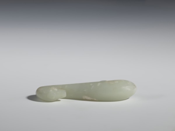 Belt clasp, Chinese, Qing 1644–1911, 17th–18th century. Milky-white slightly translucent jadeite,