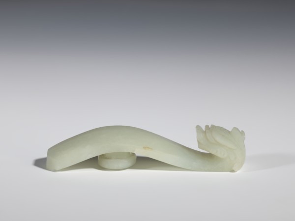 Belt clasp, stones, Milky-white jade with colloid clusters. Full-plastic carved head. Chinese, Qing