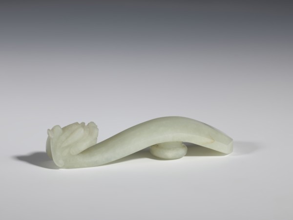 Belt clasp, stones; Chinese, Qing 1644–1911, 18th–19th century. Milky-white jade with colloid