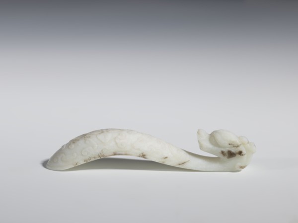 Belt clasp;, White-gray jadeite belt buckle in bas-relief and engraving, 18th–19th century, Qing