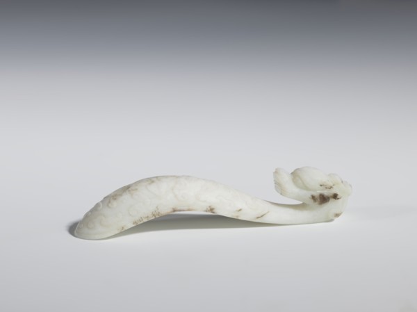 Belt clasp, Ruyi auspicious scepter motif with dragons; stem with four-petal rosette, head of the