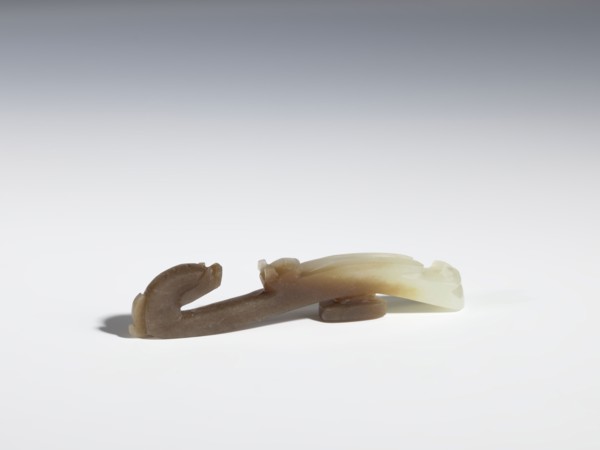 Belt clasp, Chinese, Qing 1644–1911, 17th–18th century. Gray-beige jadeite with chalcedony