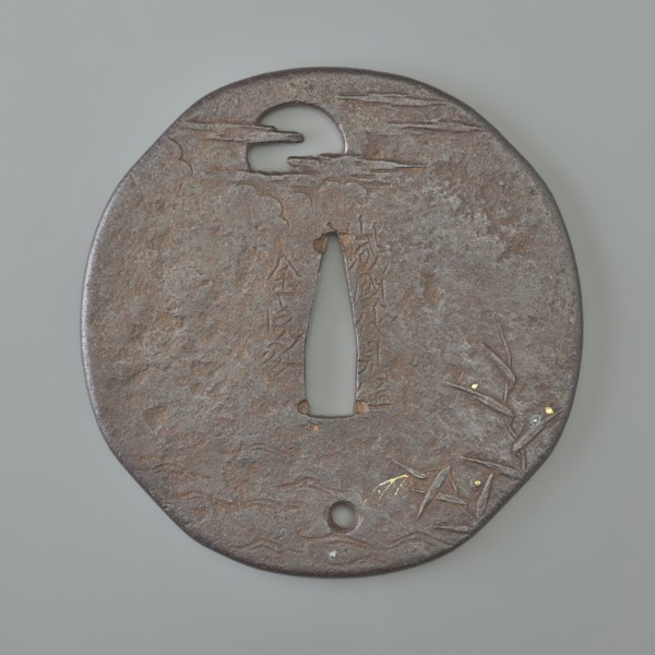 Crossguard tsuba, Kaneie,  school craftsman author. Japanese iron oval tsuba with an irregular