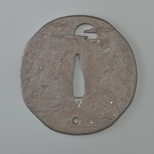 Crossguard tsuba, Kaneie,  school craftsman author. Oval tsuba with an irregular outline slightly