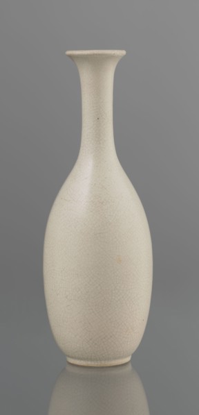 Vase on saucer. Vase made of stoneware or thick porcelain?, ovoid with a long cylindrical neck
