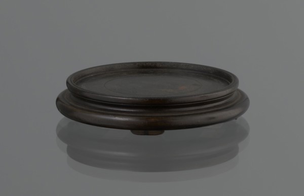 Vase on saucer. Vase made of stoneware or thick porcelain?, ovoid with a long cylindrical neck