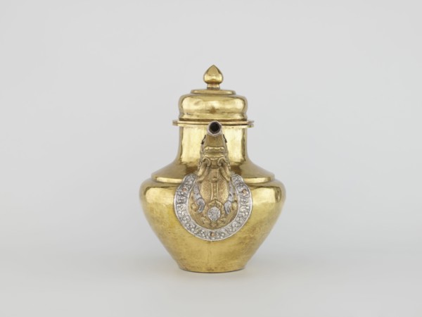 Teapot. Tibetan, 19th century, Lhasa. Jug with a lid on a chain; dragon-shaped handle, spout