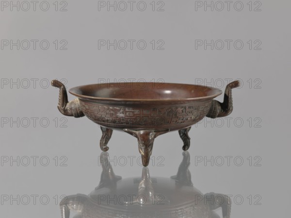 Ding vessel, Ding vessel with three legs and two handles; used for ritual hand washing. Bronze.