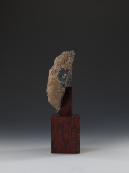 Head of Guanyin Bodhisattva, sculptor unknown. Polychrome-coated feldspar fragment of a statue with
