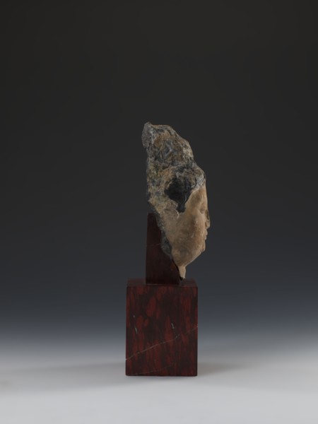 Head of Guanyin Bodhisattva, unknown sculptor; polychrome-coated feldspar fragment of a statue with