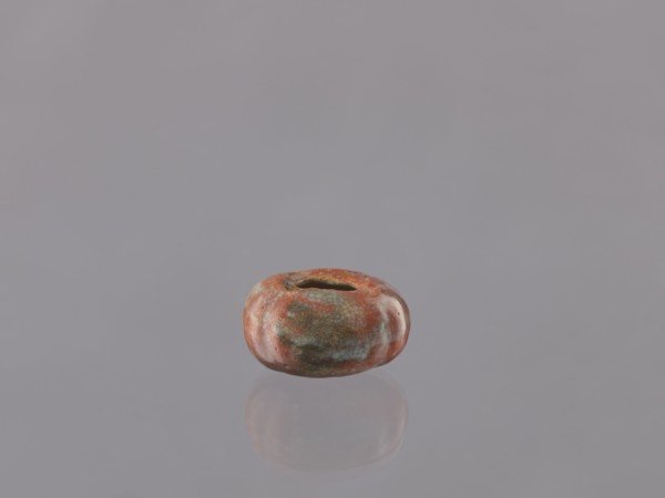 Cosmetic vessel, hand-made vessel. Vessel head made of yellowish clay, hand-formed. Reddish glaze