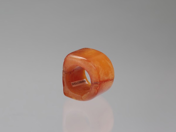 Signet ring, Chinese, Qing dynasty 1644–1911, 18th–19th century. Opaque amber with convex relief