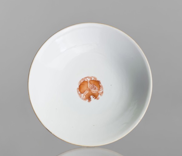 Platter, Chinese, 19th century. Porcelain platter on a tall, widening foot, white glaze, height 11