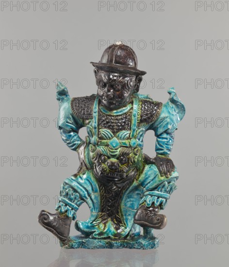 Warrior figurine, Chinese, ceramic sculpture/figurine of a male warrior, green and brown glaze,