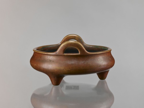 Li-type incense burner, Chinese, cast in golden-red bronze with light reddish-brown patina.