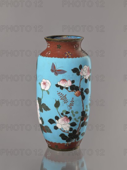 Vase. Cloisonné enamel on copper with brass rims at the spout and foot. Short, slightly flared neck