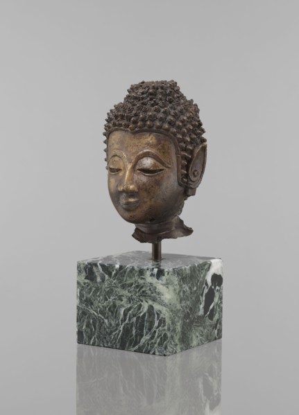Buddha head - fragment of a sculpture, Buddhist art, Buddhism, art of Southeast Asia, Thai art,