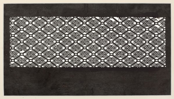 A katagami dyeing stencil for painting kimono, cut into a koshi check ornament with small floral