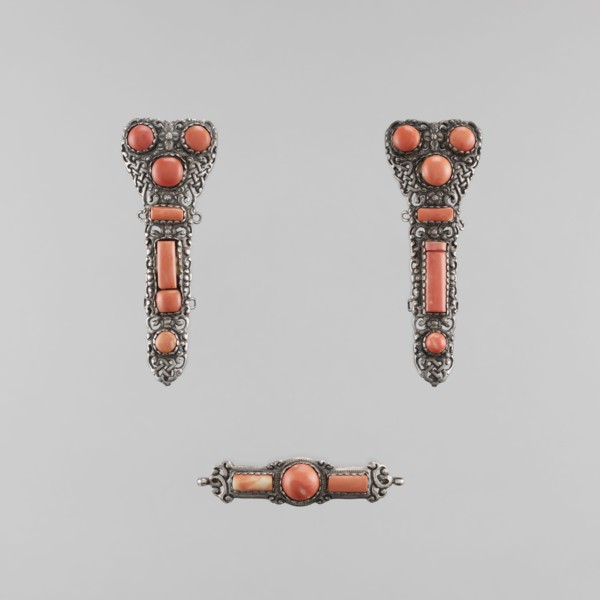 A set of braid ornaments consisting of a clasp and two pendants, late 18th century, Mongolian