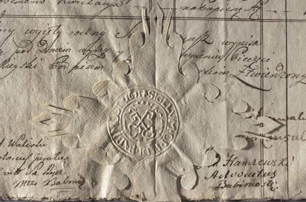 Round imprint of the seal of the town of Babimost, Poznan Voivodeship. On the crowned cartouche two