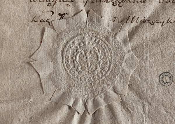 Round seal impression of the town of Inowlódz, Leczyca Voivodeship. In a decorative cartouche the