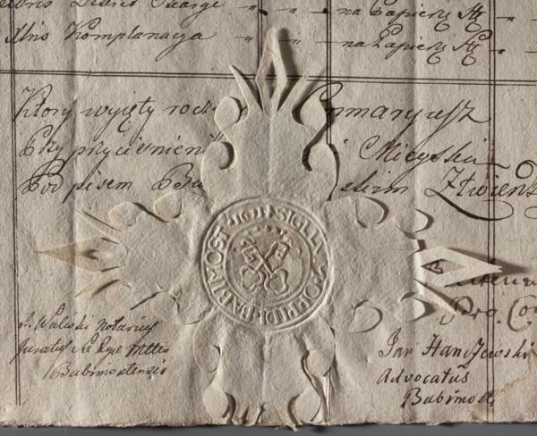 Round imprint of the seal of the town of Babimost, Poznan Voivodeship. On the crowned cartouche two