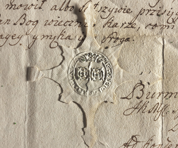 Round seal imprint of the town of Biala, Kraków voivodeship and poviat. In the central part, two