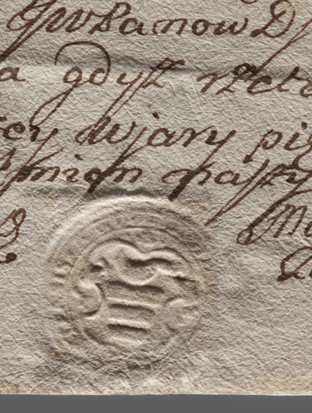 Round seal impression of the town of Bilgoraj, Lublin Voivodeship. On the decorative shield the