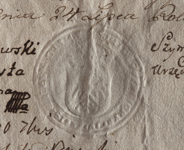 Round seal impression of the town of Gniezno. On the crowned shield a single-headed eagle.