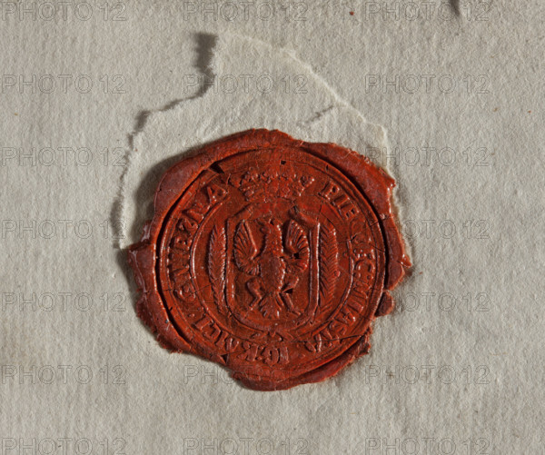 Round wax impression of the seal of the city of Gniezno. On the crowned shield a single-headed