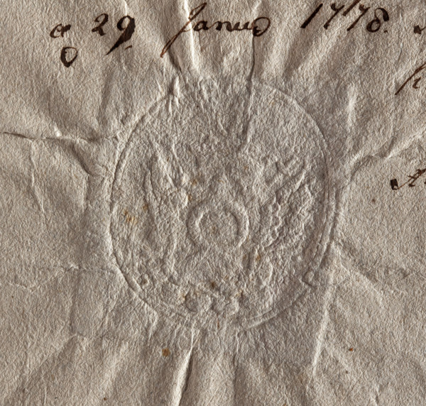 Oval seal impression of the Grabowo town seal. On the shield, the Nalecz coat of arms with a jewel