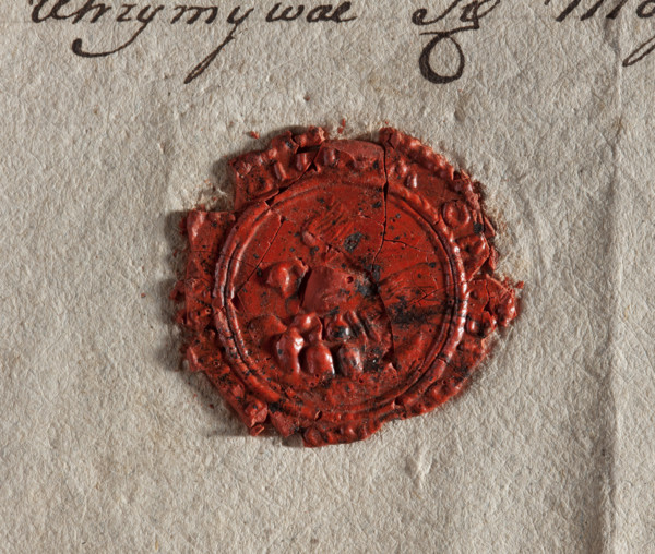 Round wax impression of the seal of Grabów. Pelican turned to the right on the nest, feeding chicks