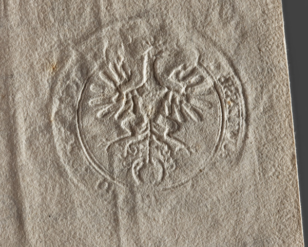 Round seal impression of the town of Grzybowo, Masovian Voivodeship. Single-headed crowned eagle