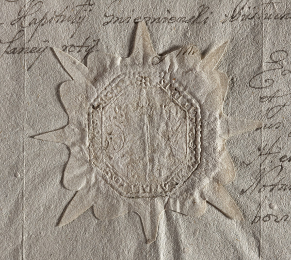 Rectangular seal impression with truncated corners of the town of Grzybowo. Depicts a