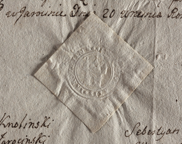 Round seal impression of the town of Jarocin, Sieradz Voivodeship. Tower with an open gate, topped